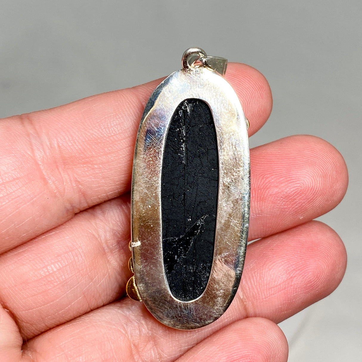 Black Tourmaline Oval Raw Pendant in a Decorative Setting KPGJ4595