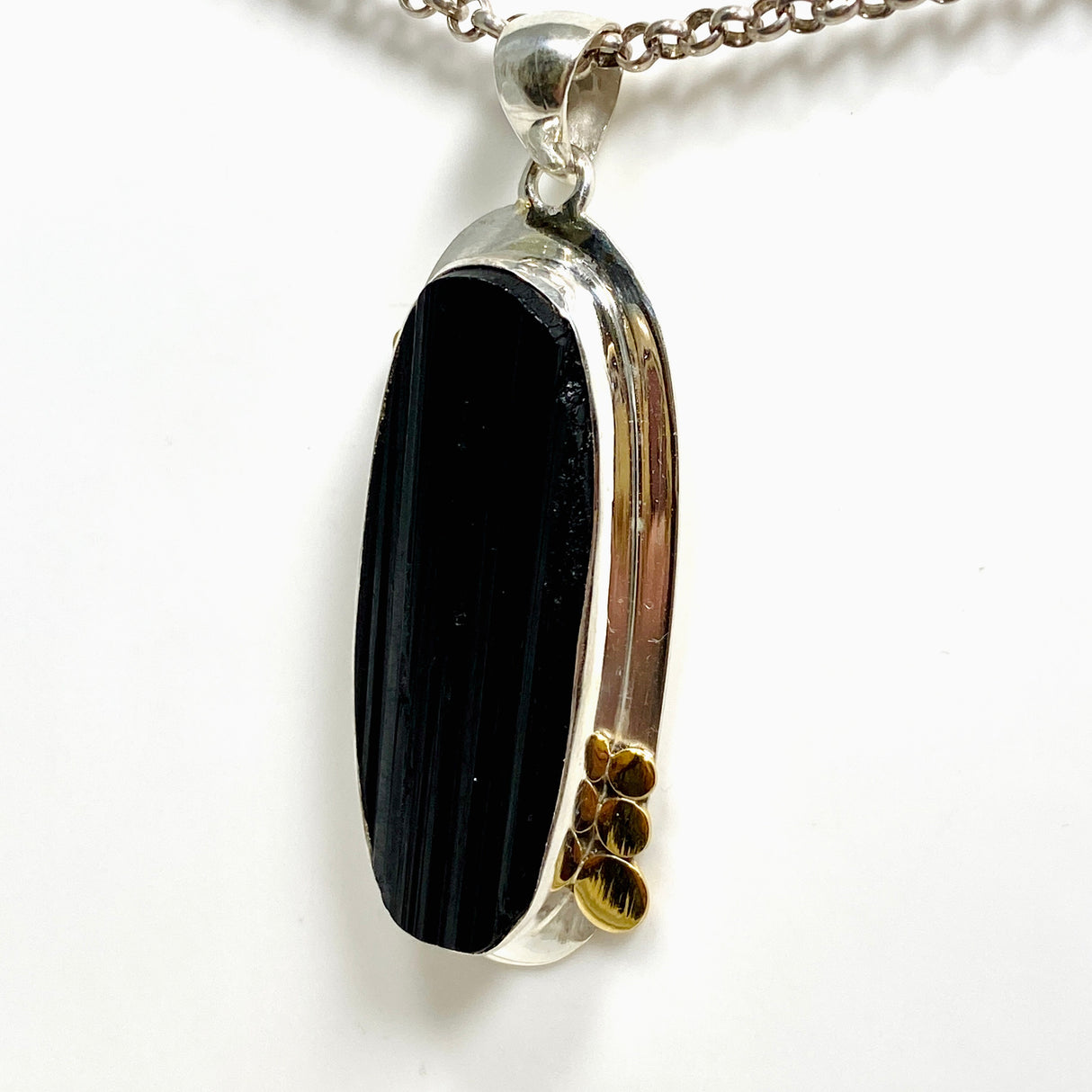 Black Tourmaline Oval Raw Pendant in a Decorative Setting KPGJ4595