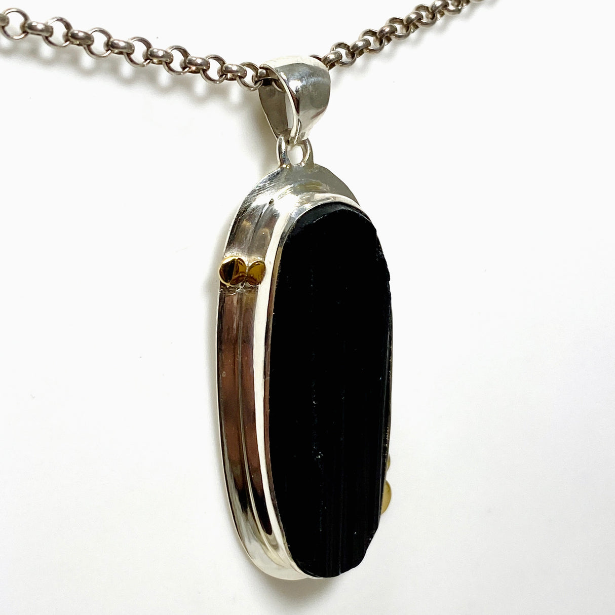 Black Tourmaline Oval Raw Pendant in a Decorative Setting KPGJ4595