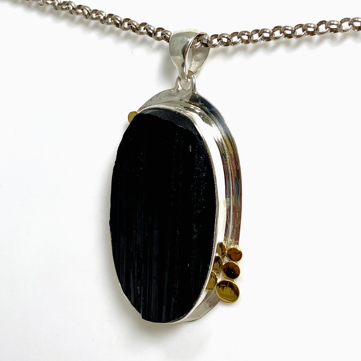 Black Tourmaline Oval Raw Pendant in a Decorative Setting KPGJ4596