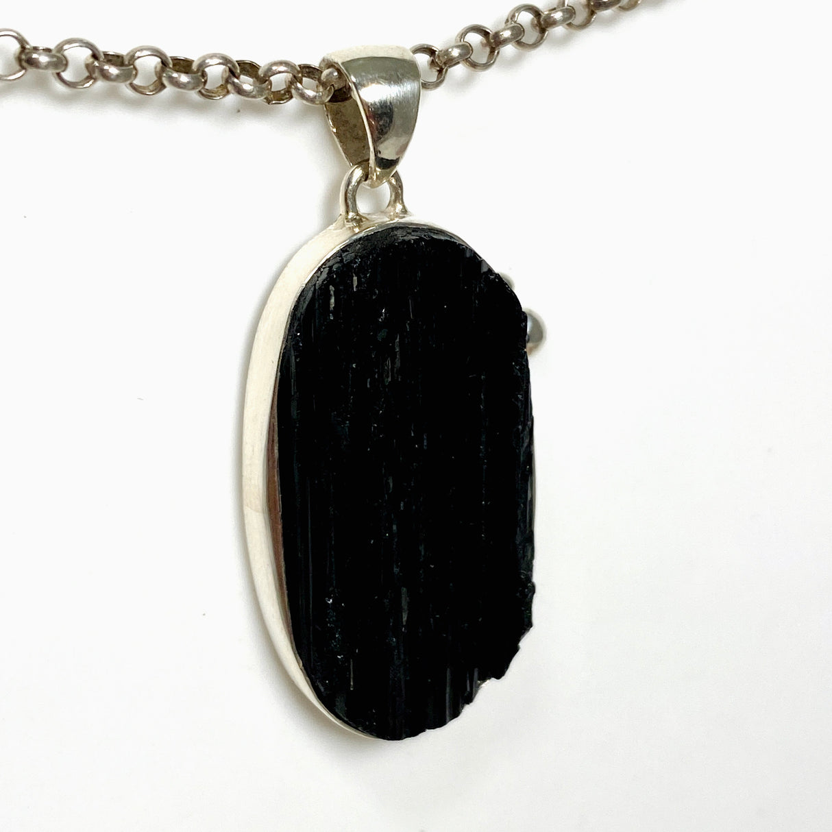 Black Tourmaline Oval Raw Pendant in a Decorative Setting KPGJ4597