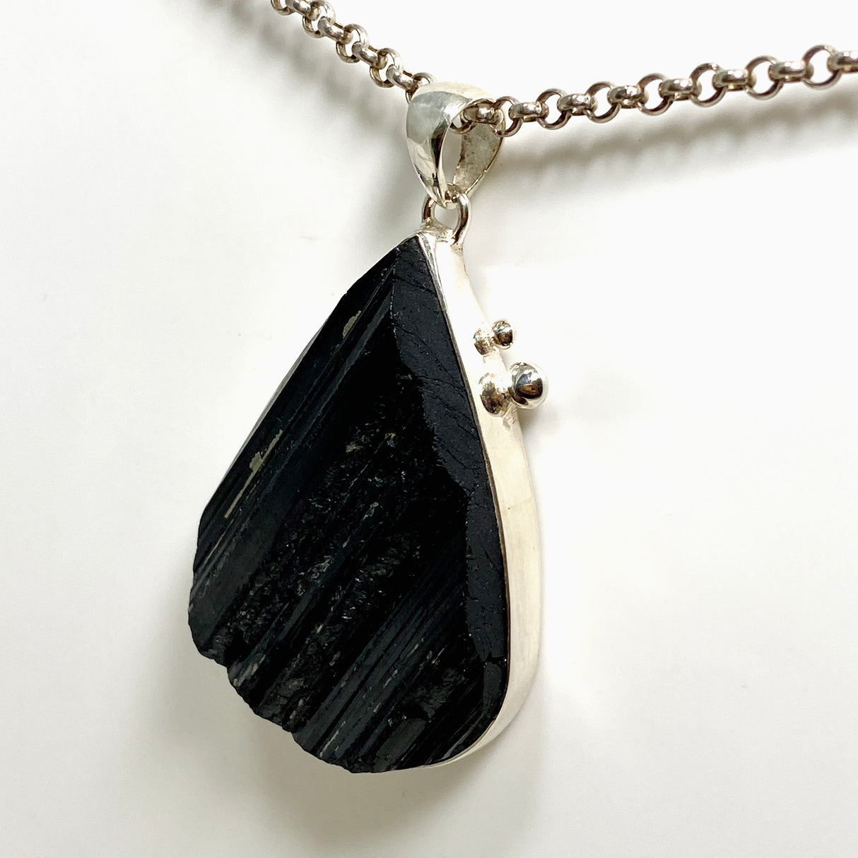 Black Tourmaline Teardrop Raw Pendant in a Decorative Setting KPGJ4599