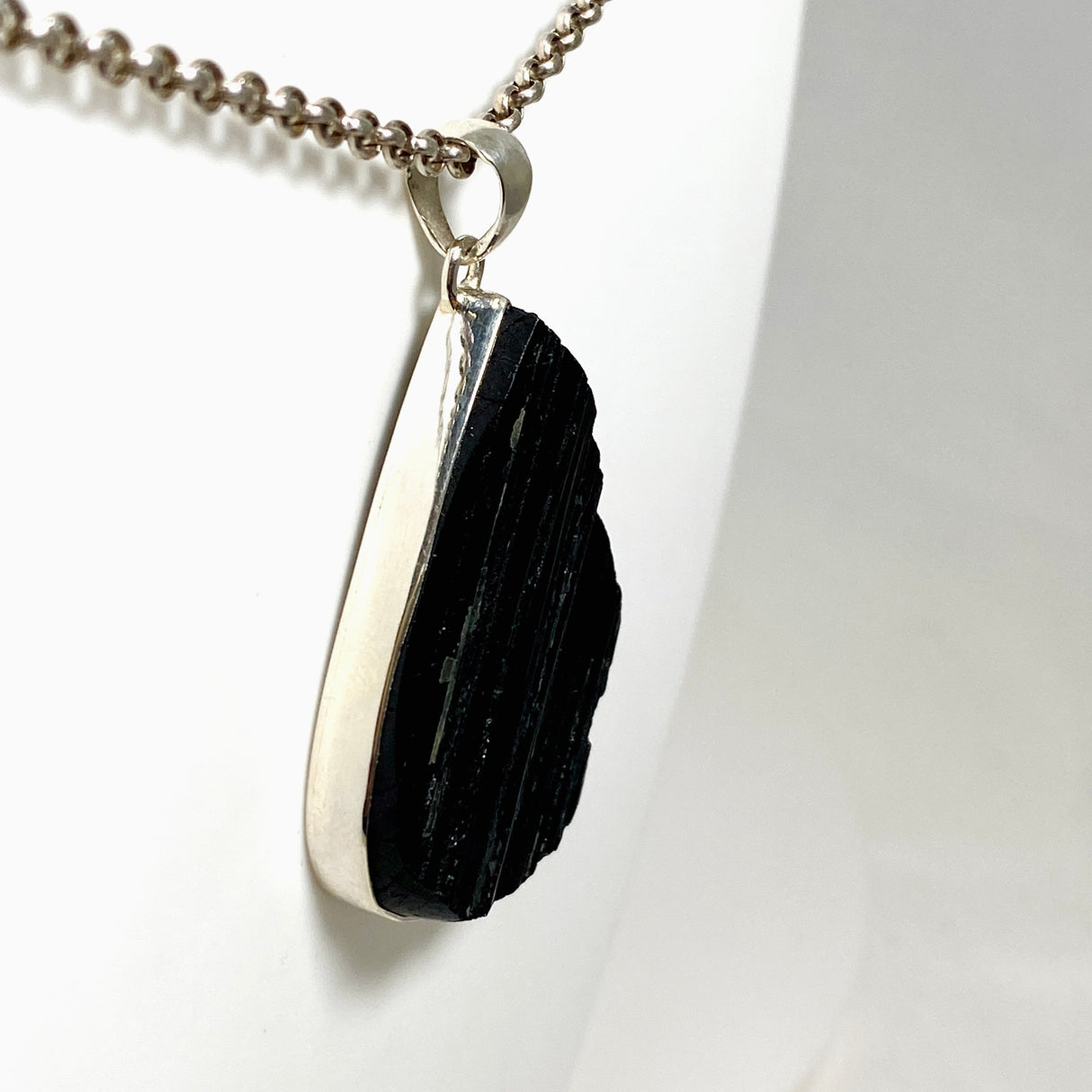 Black Tourmaline Teardrop Raw Pendant in a Decorative Setting KPGJ4599