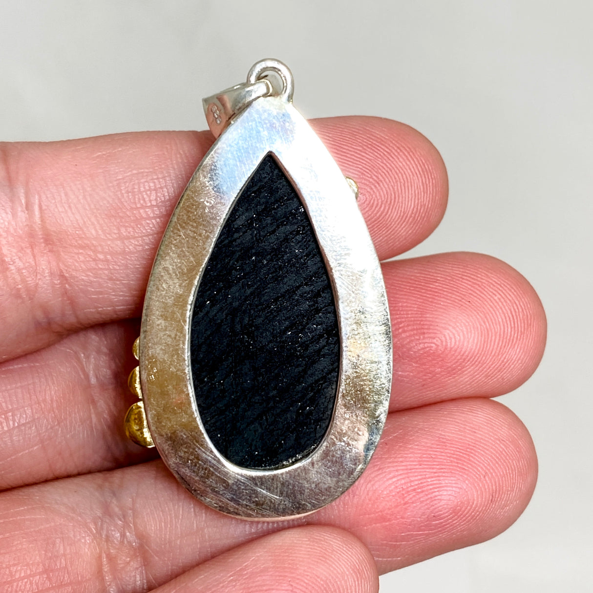 Black Tourmaline Teardrop Raw Pendant in a Decorative Setting KPGJ4600