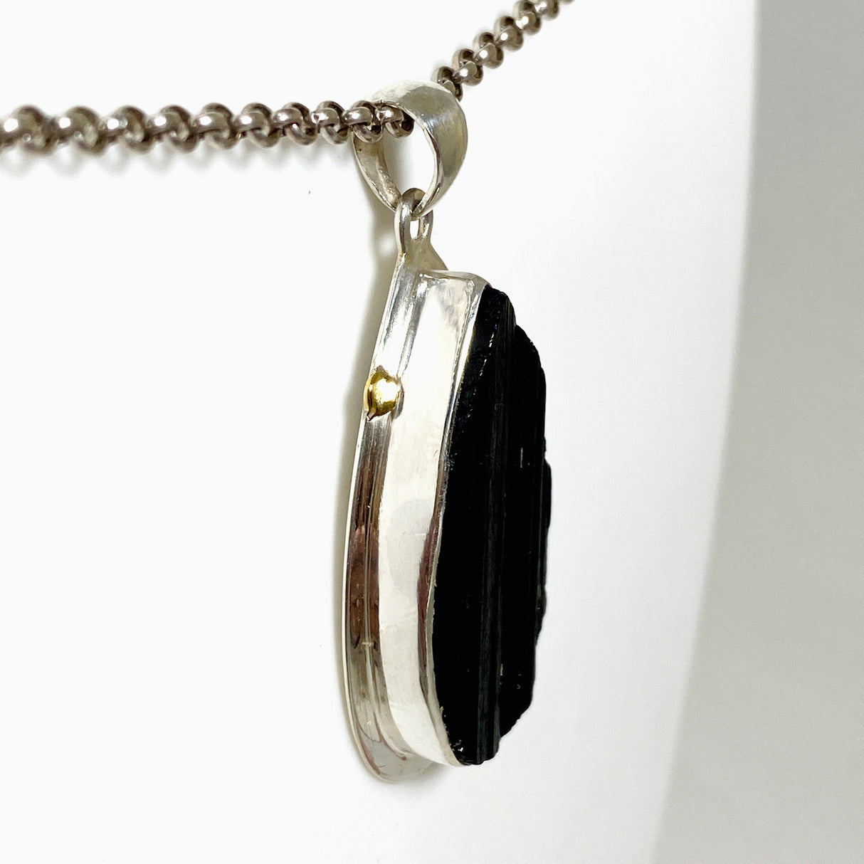 Black Tourmaline Teardrop Raw Pendant in a Decorative Setting KPGJ4600