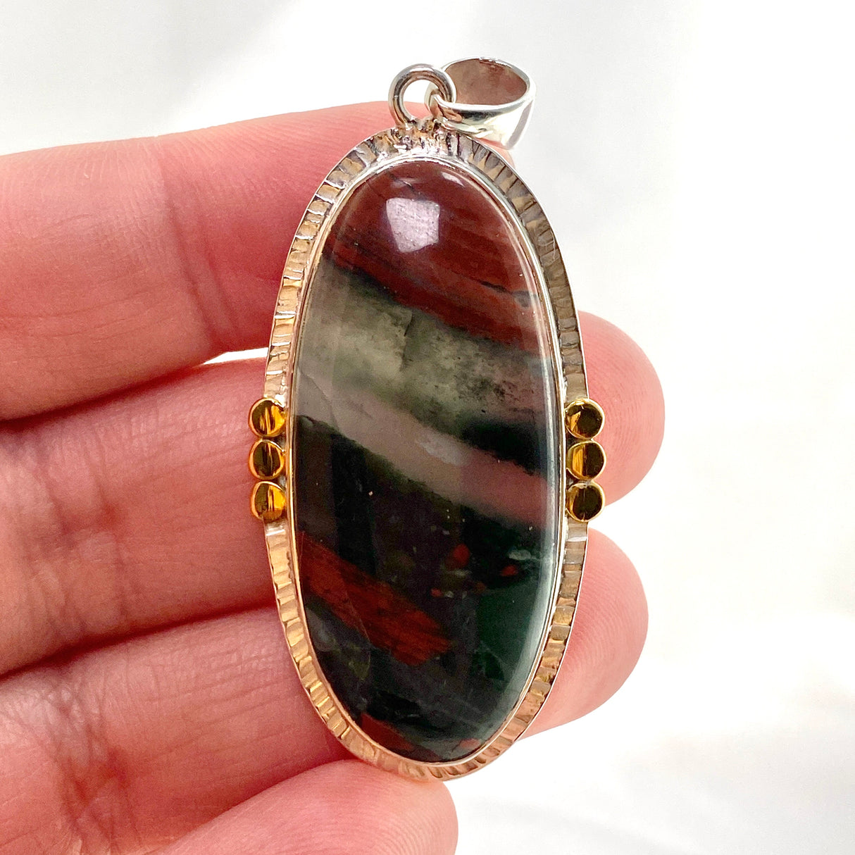 Bloodstone Oval Cabochon Pendant in a Decorative Setting with Brass Accents KPGJ4745