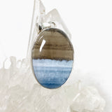 Blue Owhyee Opal Oval Cabochon Pendant in a Hammered Setting KPGJ4651