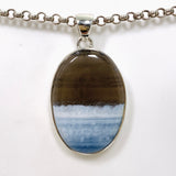 Blue Owhyee Opal Oval Cabochon Pendant in a Hammered Setting KPGJ4651