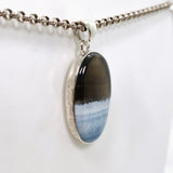 Blue Owhyee Opal Oval Cabochon Pendant in a Hammered Setting KPGJ4651