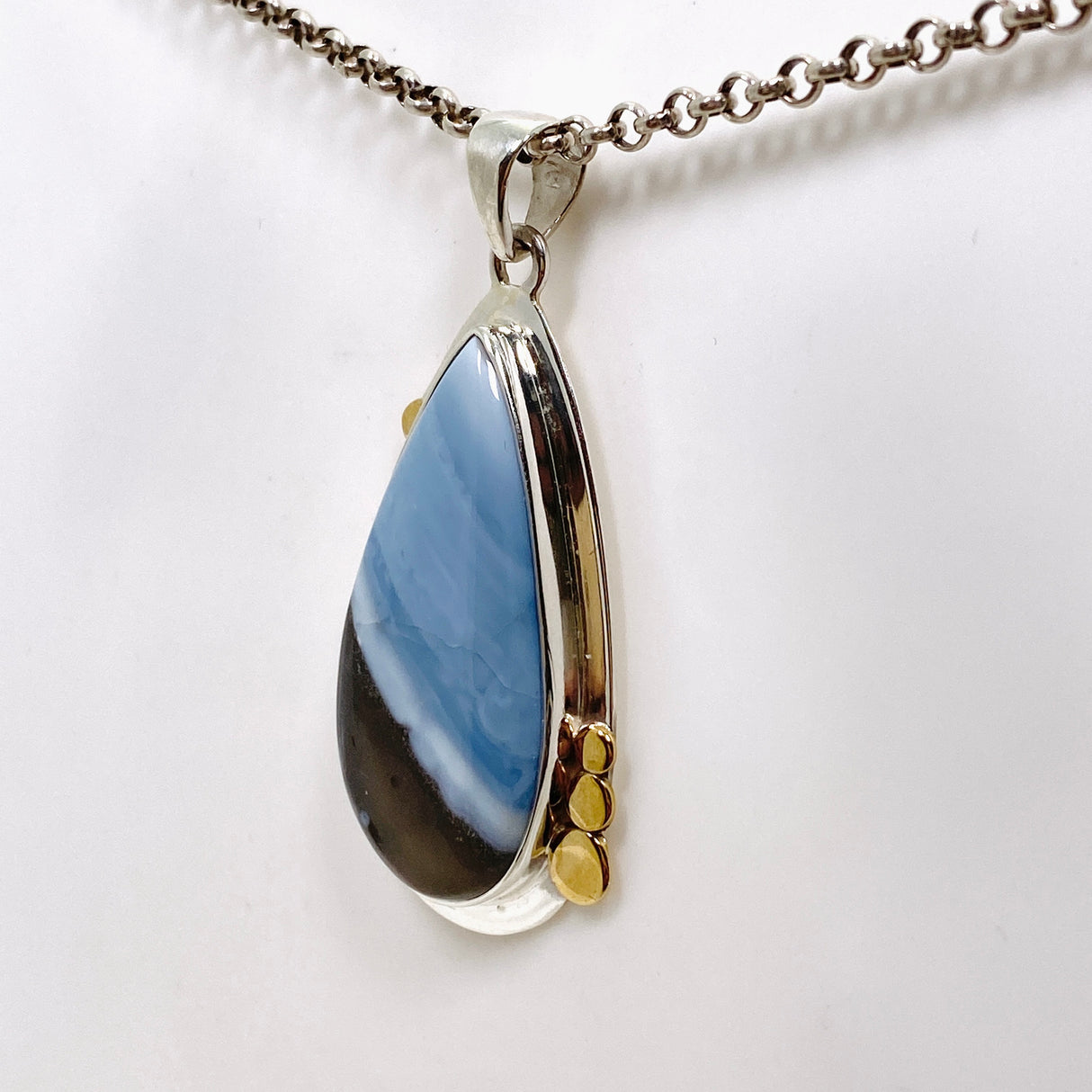 Blue Owhyee Opal Teardrop Cabochon Pendant with Brass Details KPGJ4649