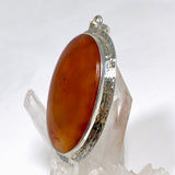 Carnelian Oval pendant in a decorative hammered setting KPGJ4579