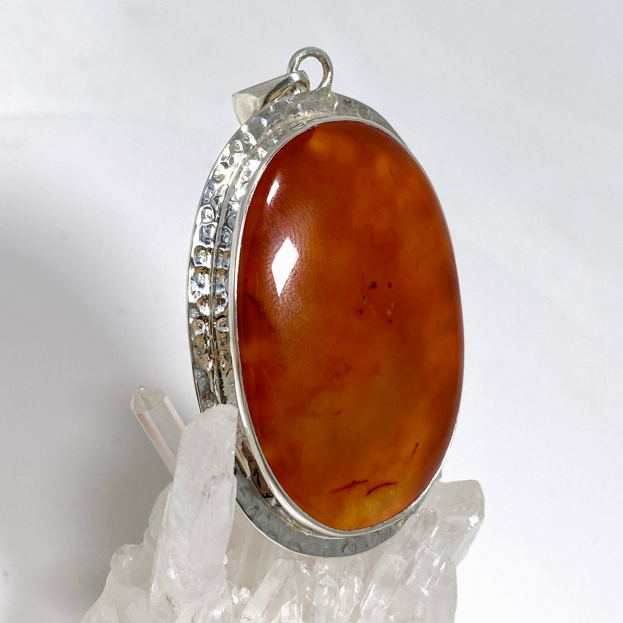 Carnelian Oval pendant in a decorative hammered setting KPGJ4579