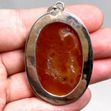 Carnelian Oval pendant in a decorative hammered setting KPGJ4579