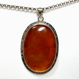 Carnelian Oval pendant in a decorative hammered setting KPGJ4579