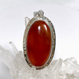 Carnelian Oval pendant in a decorative hammered setting KPGJ4580