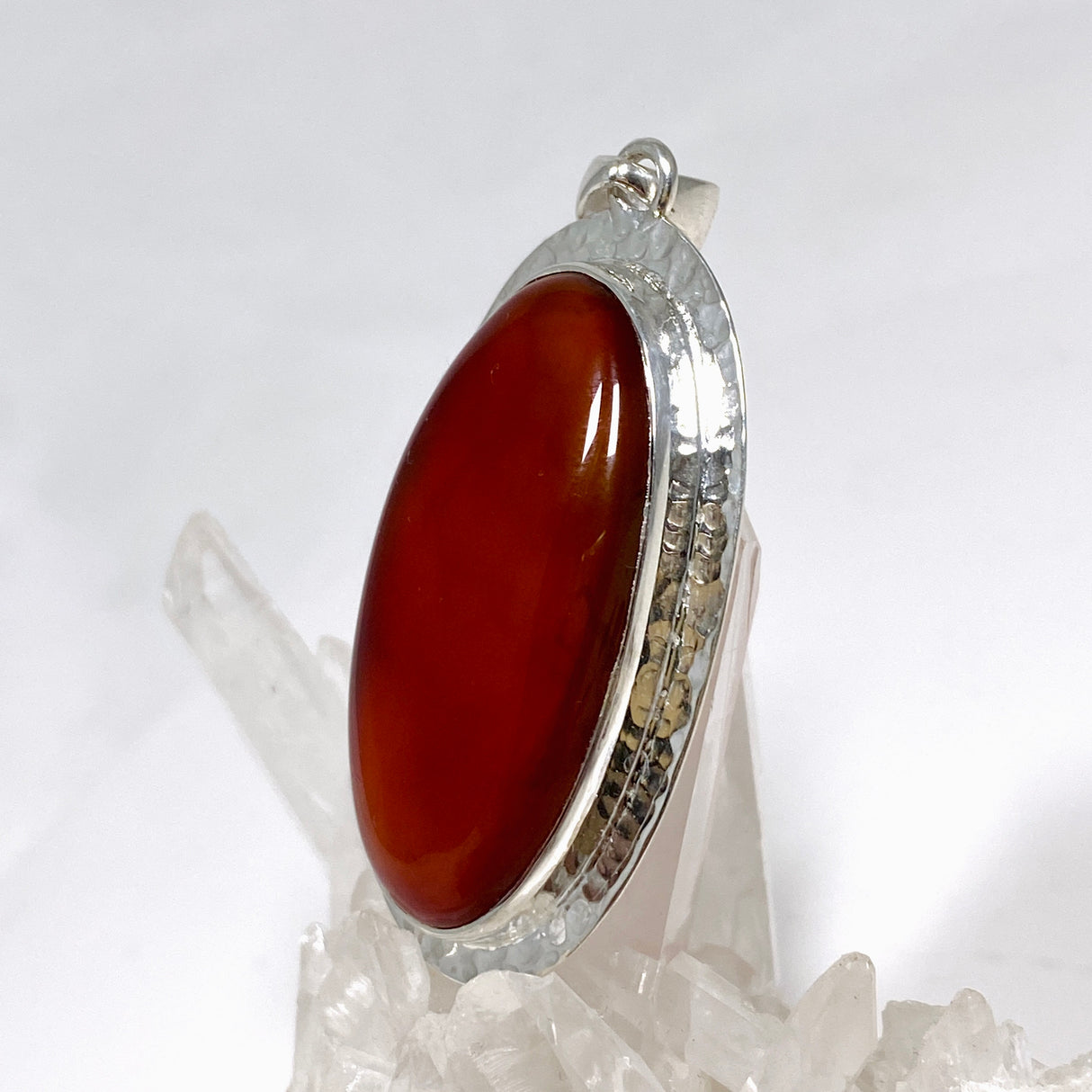 Carnelian Oval pendant in a decorative hammered setting KPGJ4580