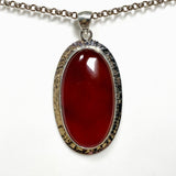 Carnelian Oval pendant in a decorative hammered setting KPGJ4580