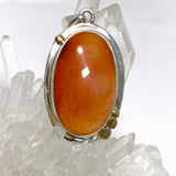 Carnelian Oval pendant with a brass decorative setting KPGJ4582