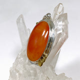 Carnelian Oval pendant with a brass decorative setting KPGJ4582