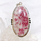 Cinnabar Oval Cabochon Pendant in a Decorative Setting KPGJ4752