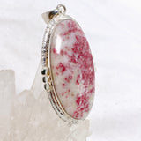 Cinnabar Oval Cabochon Pendant in a Decorative Setting KPGJ4752