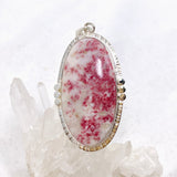 Cinnabar Oval Cabochon Pendant in a Decorative Setting KPGJ4752