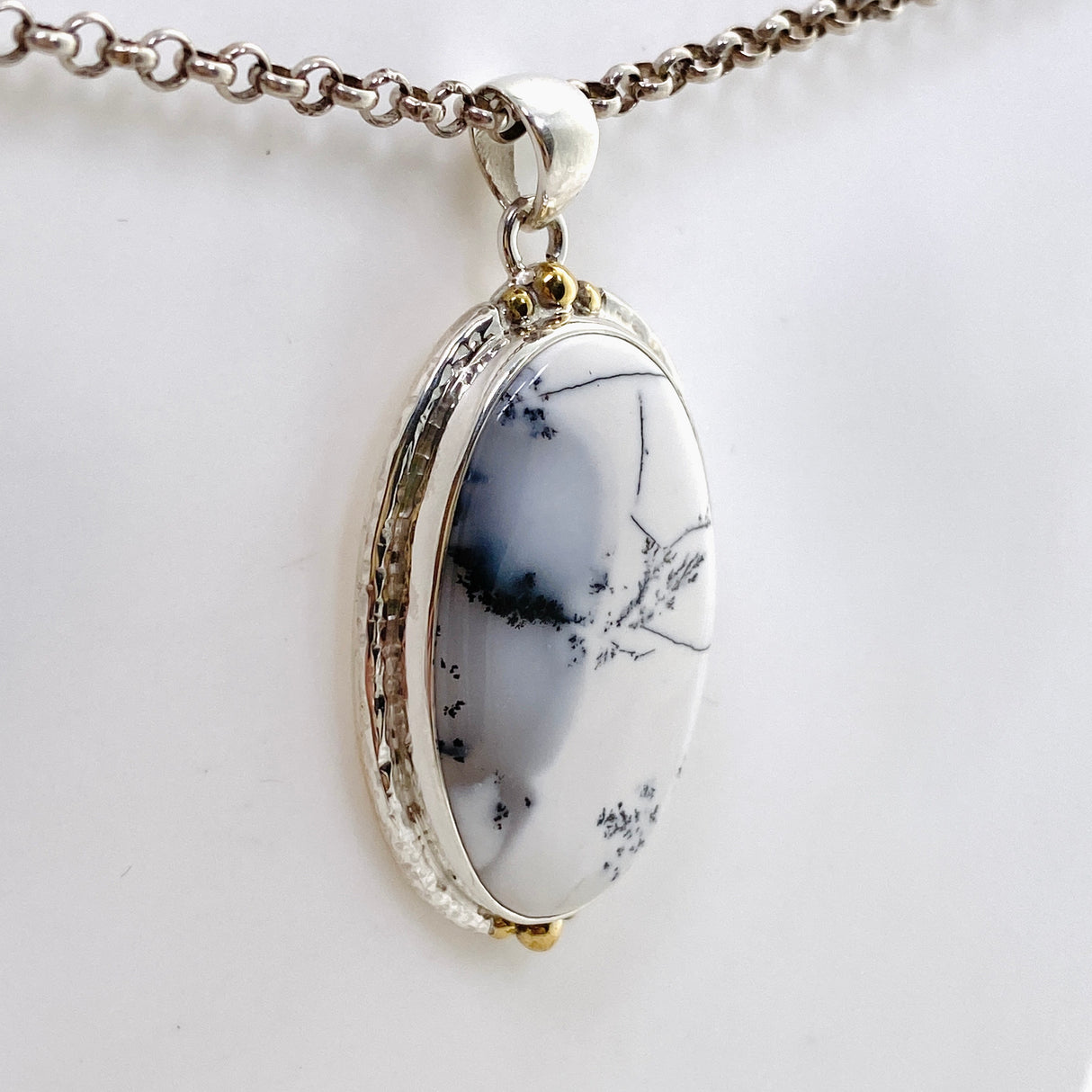 Dendritic Opal Oval Cabochon Pendant in a Decorative Setting KPGJ4676