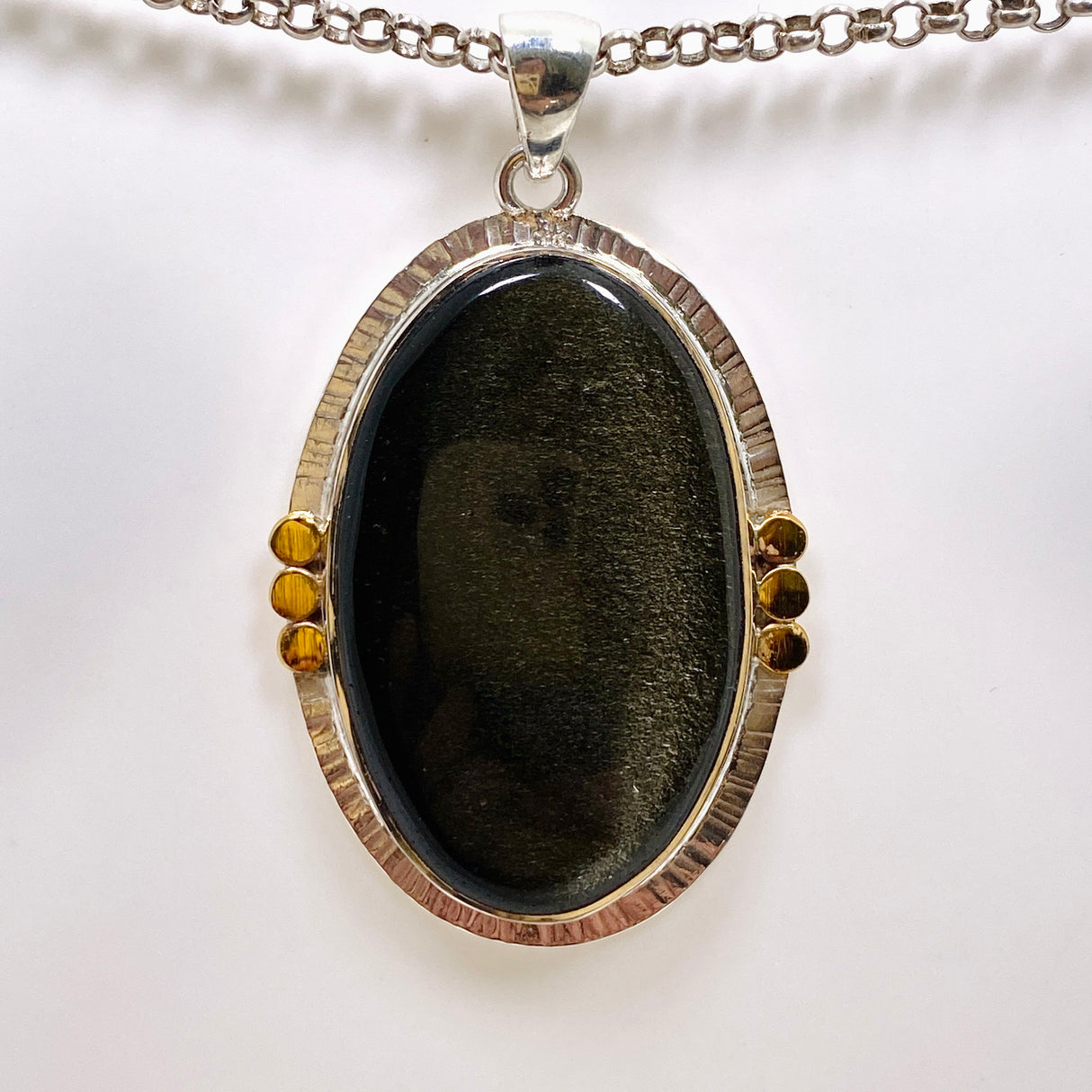 Goldsheen Obsidian Oval Cabochon Pendant in a Decorative Setting KPGJ4758