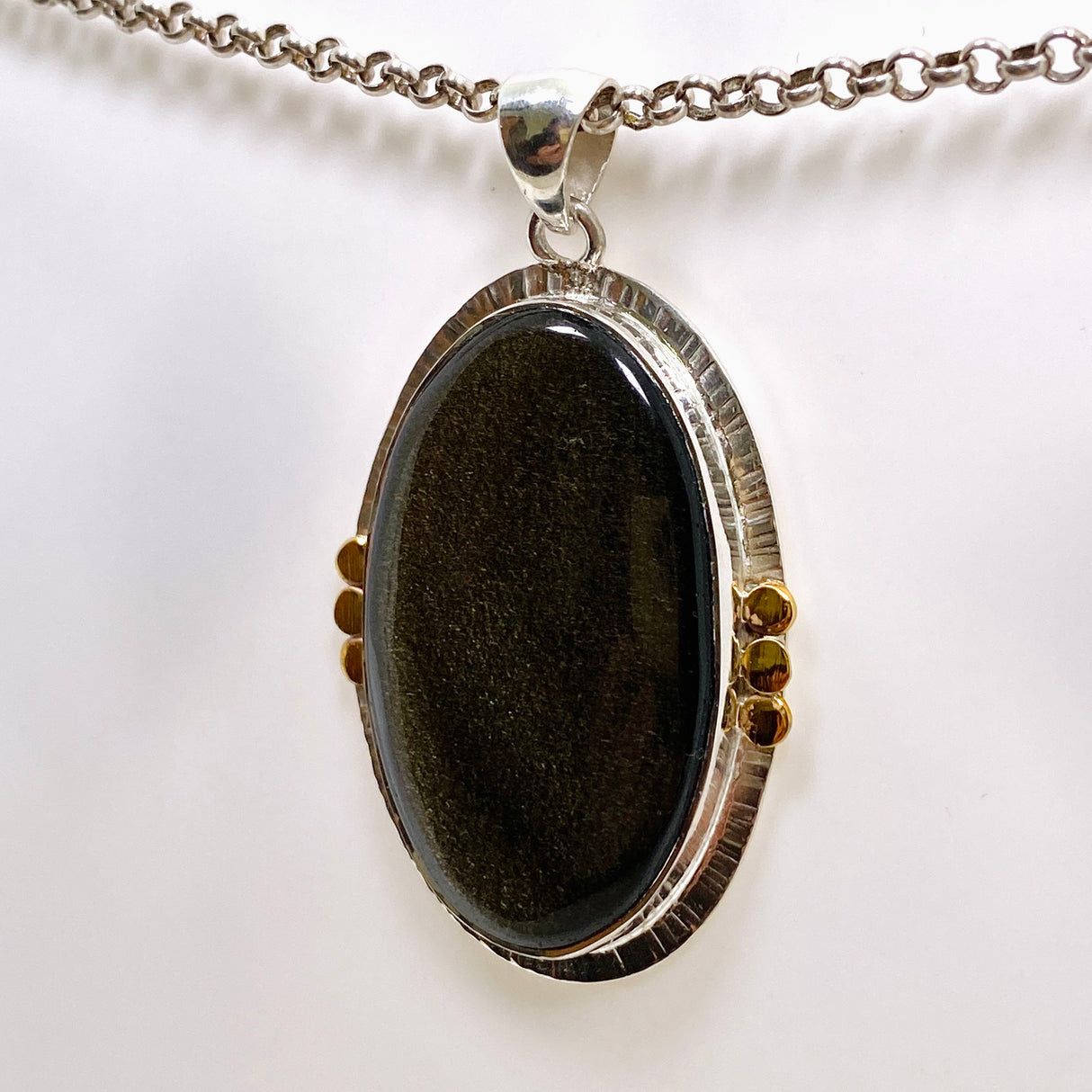 Goldsheen Obsidian Oval Cabochon Pendant in a Decorative Setting KPGJ4758