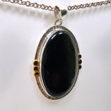 Goldsheen Obsidian Oval Cabochon Pendant in a Decorative Setting KPGJ4758