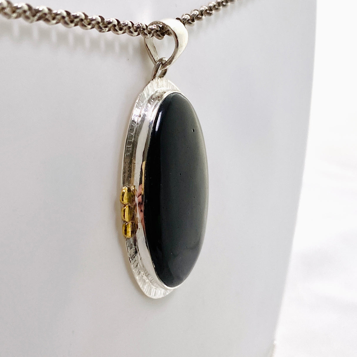 Goldsheen Obsidian Oval Cabochon Pendant in a Decorative Setting KPGJ4758