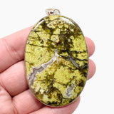 Green Opal (Madagascar) Druzy Oval Cabochon Pendant in a Hammered Setting KPGJ4655