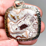 Mexican Crazy Lace Agate Square Pendant in a decorative hammered setting KPGJ4575