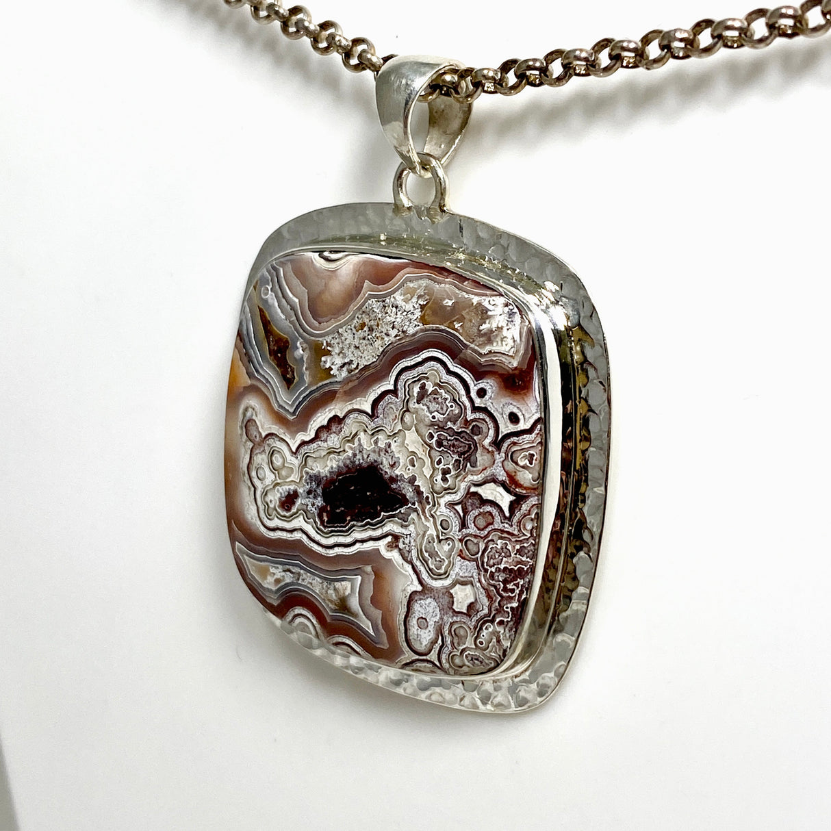 Mexican Crazy Lace Agate Square Pendant in a decorative hammered setting KPGJ4575