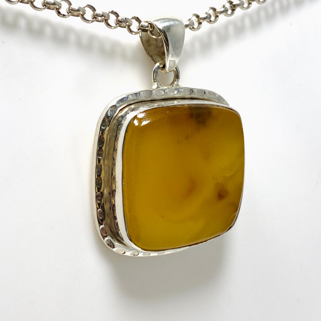 Natural Amber Square Pendant in a Hammered Setting KPGJ4339