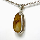 Natural Amber Teardrop Pendant in a Hammered Setting KPGJ4340