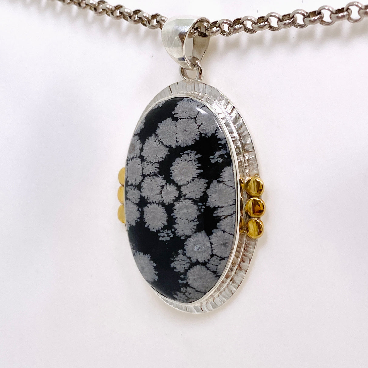 Snowflake Obsidian Oval Cabochon Pendant in a Decorative Setting KPGJ4772