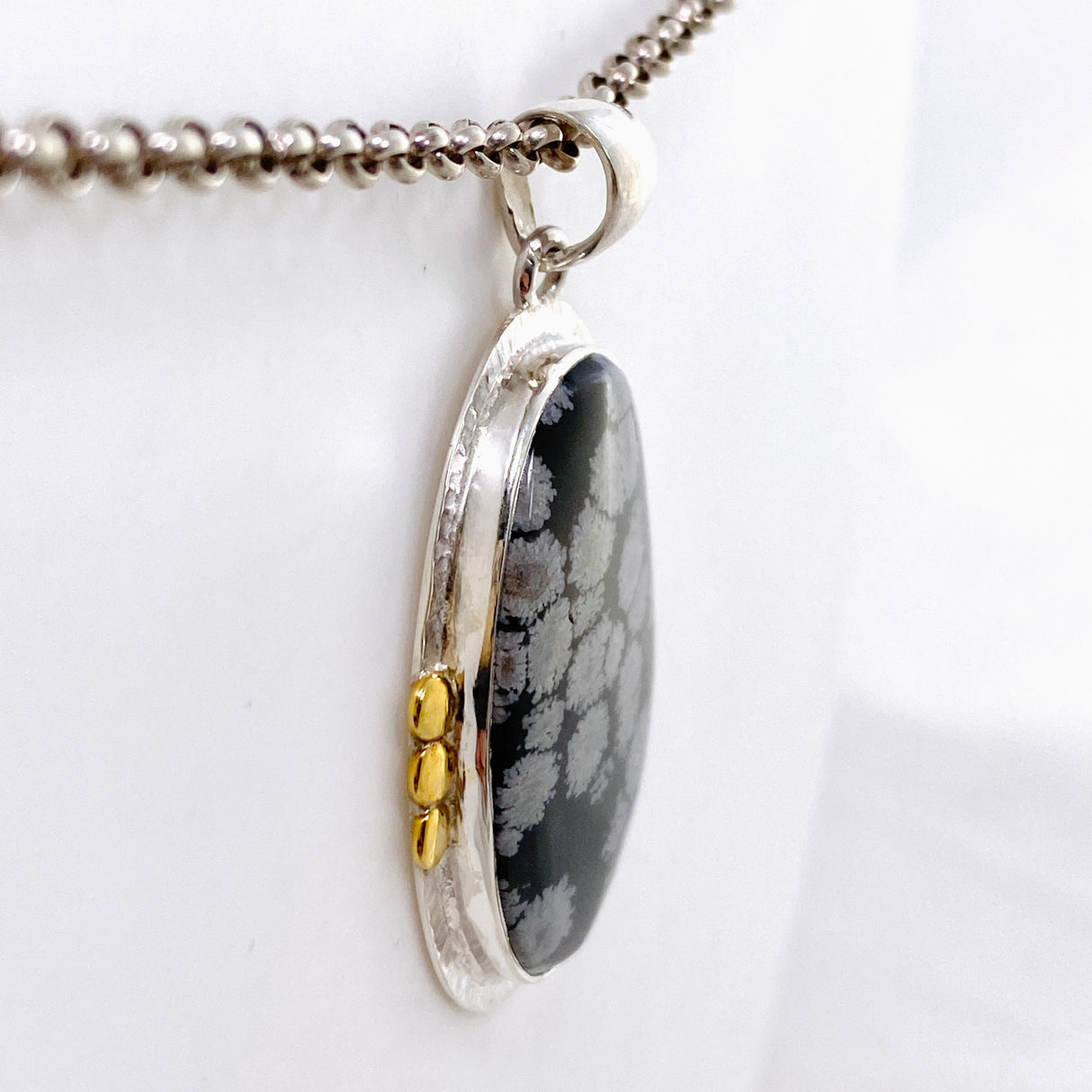 Snowflake Obsidian Oval Cabochon Pendant in a Decorative Setting KPGJ4772