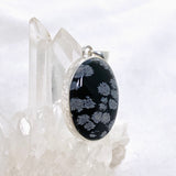 Snowflake Obsidian Oval Cabochon Pendant in a Hammered Setting KPGJ4771