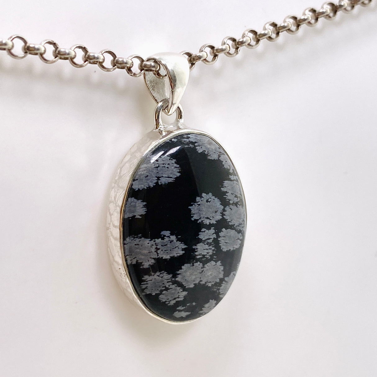 Snowflake Obsidian Oval Cabochon Pendant in a Hammered Setting KPGJ4771