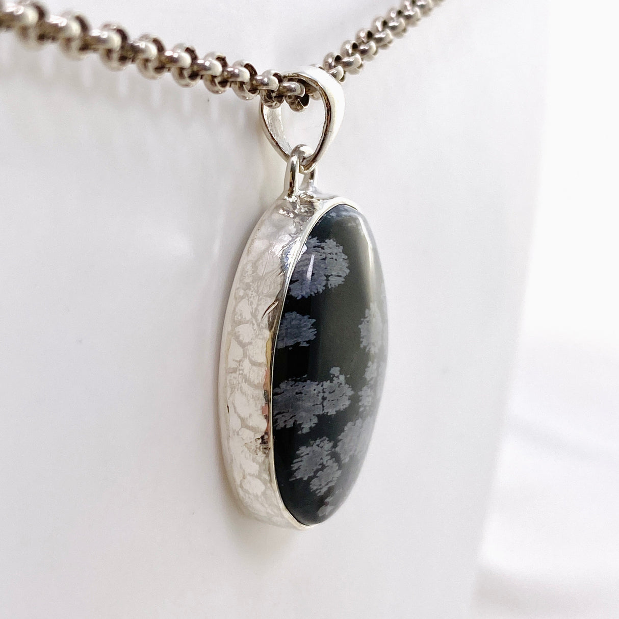 Snowflake Obsidian Oval Cabochon Pendant in a Hammered Setting KPGJ4771