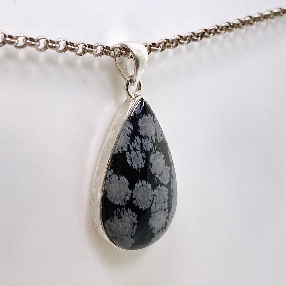 Snowflake Obsidian Teardrop Cabochon Pendant in a Hammered Setting KPGJ4774