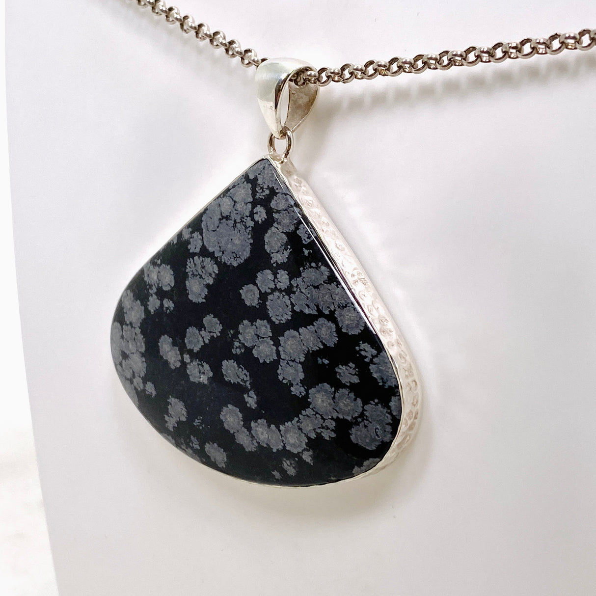 Snowflake Obsidian Teardrop Cabochon Pendant in a Hammered Setting KPGJ4775