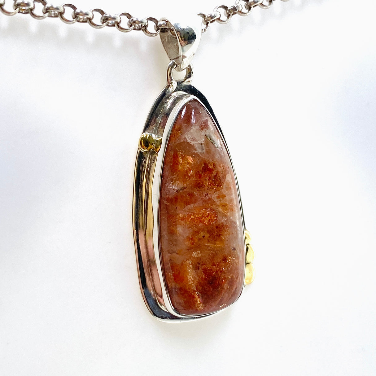 Sunstone Freeform Cabochon Pendant in a Decorative Setting KPGJ4694