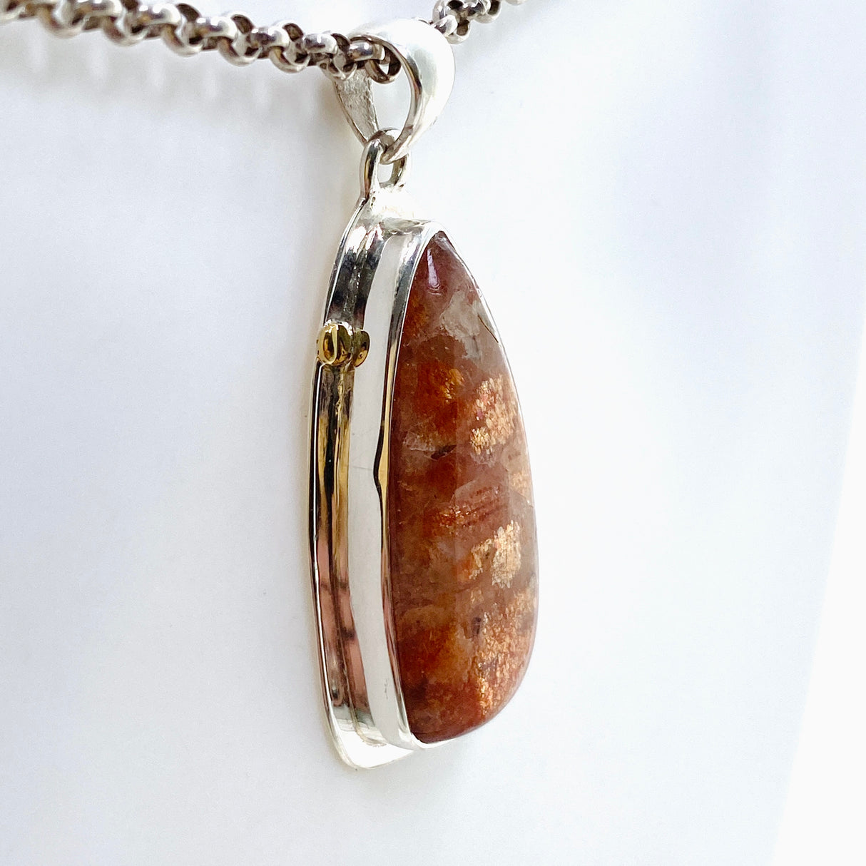 Sunstone Freeform Cabochon Pendant in a Decorative Setting KPGJ4694