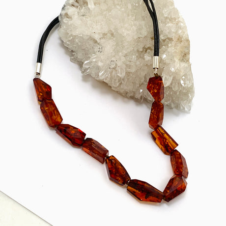 Baltic Amber Cognac beaded necklace on black leather AMB308