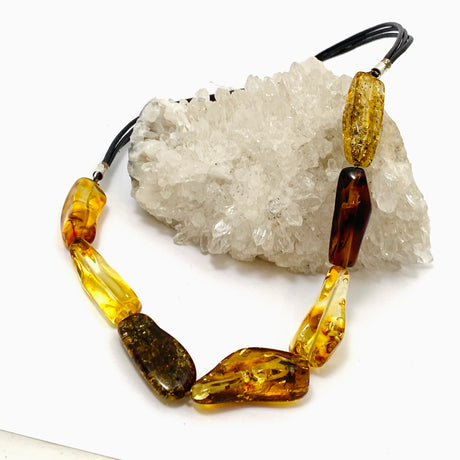 Baltic Amber Mixed beaded necklace on black leather AMB307