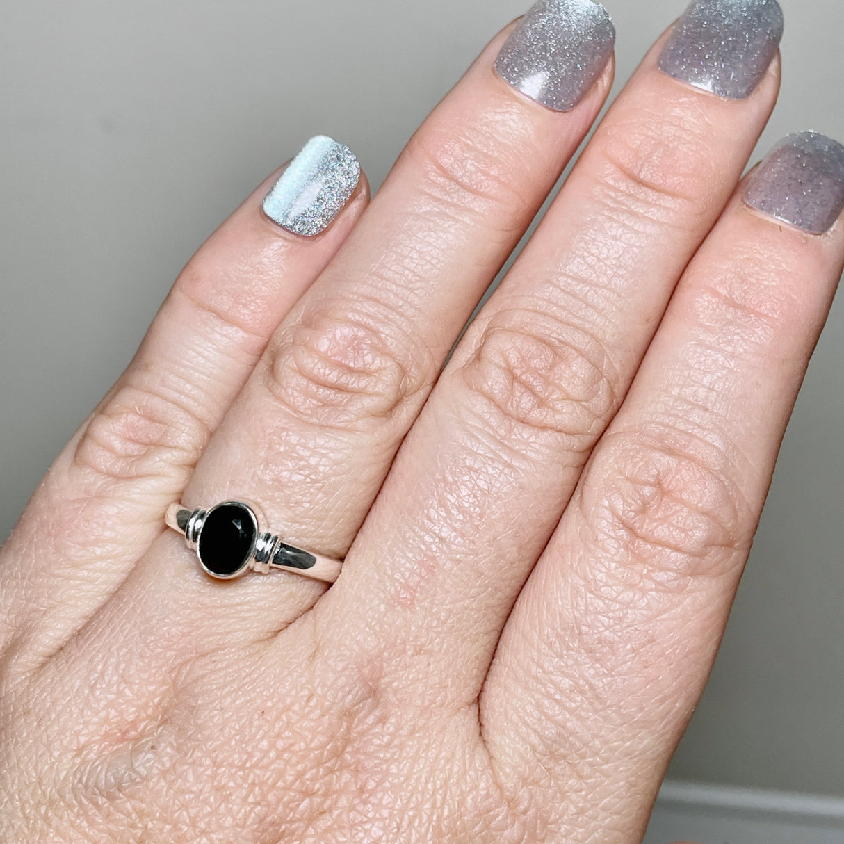 Black Onyx Oval Faceted Stone in a Decorative Setting R4831