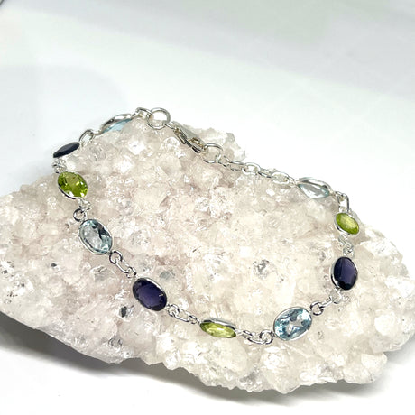 Blue Topaz, Peridot and Iolite facteted gemstones in 925 silver bezel setting bracelet PBGJ024