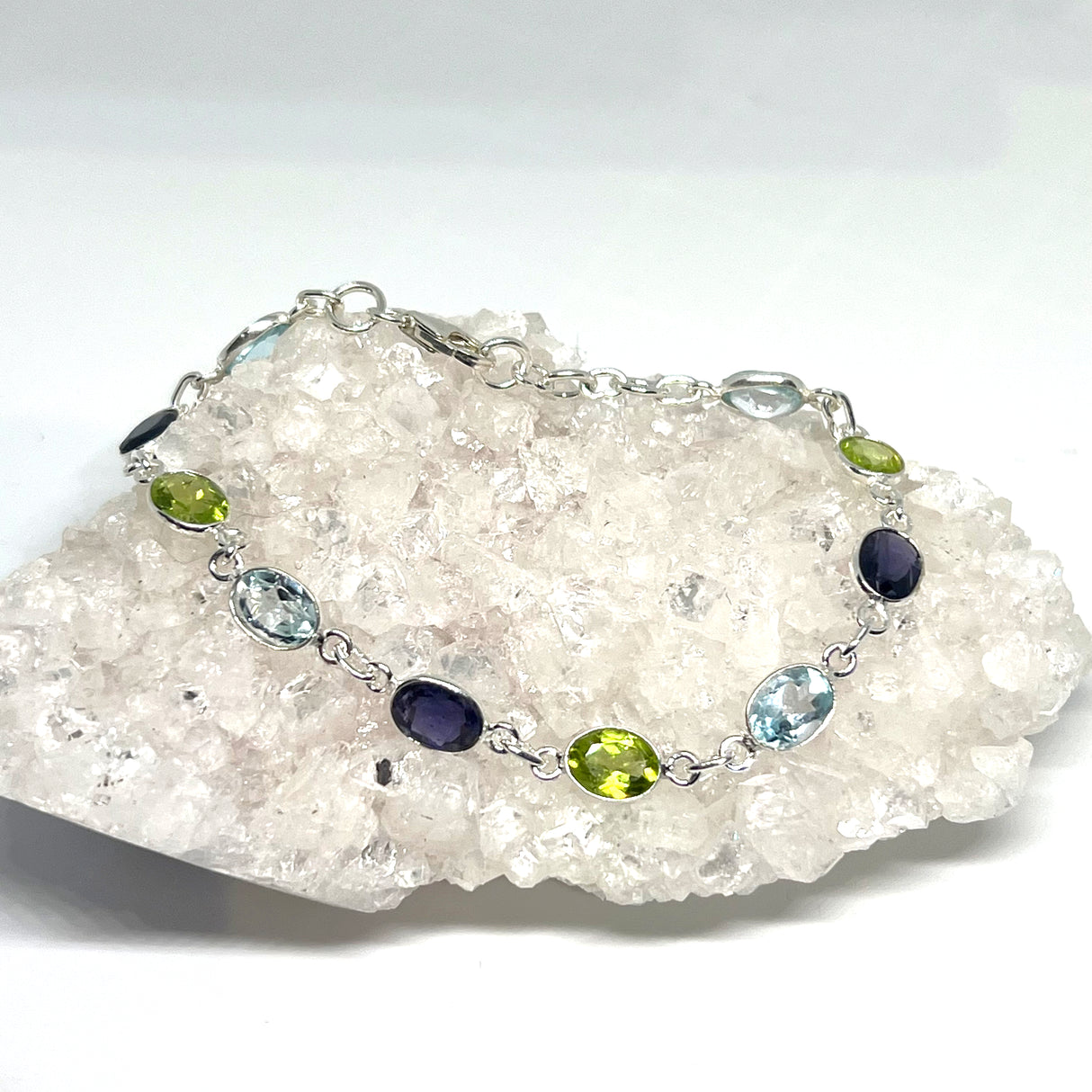 Blue Topaz, Peridot and Iolite facteted gemstones in 925 silver bezel setting bracelet PBGJ024